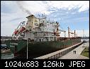 a green Bluewing - Bluewing departing Lock 3 2015-0416 IMG_0276.jpg-bluewing-departing-lock-3-2015-0416-img_0276.jpg