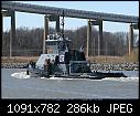 -tug-duty-towing-empty-coal-barge-3-07e.jpg