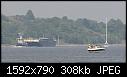 -tug-active-towing-empty-coal-barge-7-06.jpg