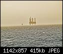 Please see read me - gulf of suez-27-1-08 oil drilling rig well in evening mist 01_cml size.jpg (1/1)-gulf-suez-27-1-08-oil-drilling-rig-well-evening-mist-01_cml-size.jpg