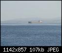 A taste of the port - - safaga 30-1-08 unidentified bulk carrier in far distance &amp; sunken vessel farther away.jpg (1/1)-safaga-30-1-08-demo.jpg