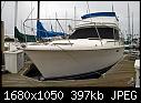 Here's my boat.  Not exactly a tall ship-here-she-.jpg